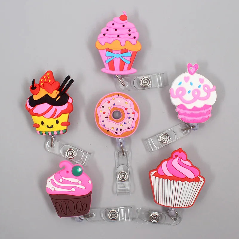 Add fun to your work or school day with this adorable 1PC Donuts & Cake Retractable Badge Reel. Perfect for kids, students, or nurses, it features a durable ABS reel, silica gel clip, and a 60cm retractable length. A cute, practical way to carry your ID or name tag with style!