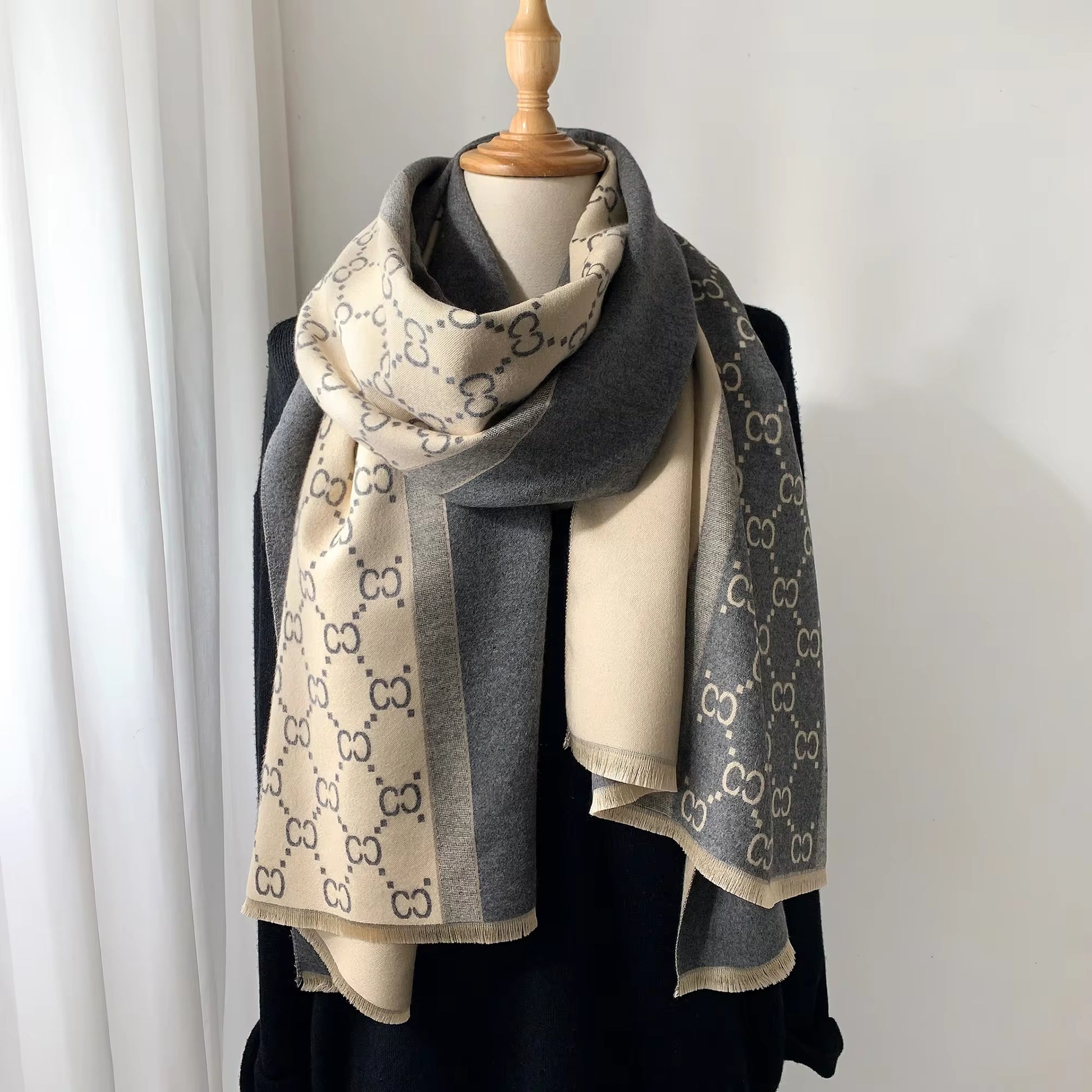 Stay warm and stylish this winter with our Luxury Women's Scarf. Made from soft, cashmere-feel fabric, this double-sided scarf offers both comfort and elegance. Perfect for layering, it’s a must-have accessory for cold weather, adding warmth and luxury to your winter wardrobe.