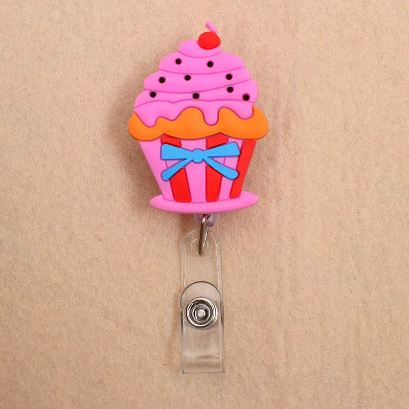 Add fun to your work or school day with this adorable 1PC Donuts & Cake Retractable Badge Reel. Perfect for kids, students, or nurses, it features a durable ABS reel, silica gel clip, and a 60cm retractable length. A cute, practical way to carry your ID or name tag with style!