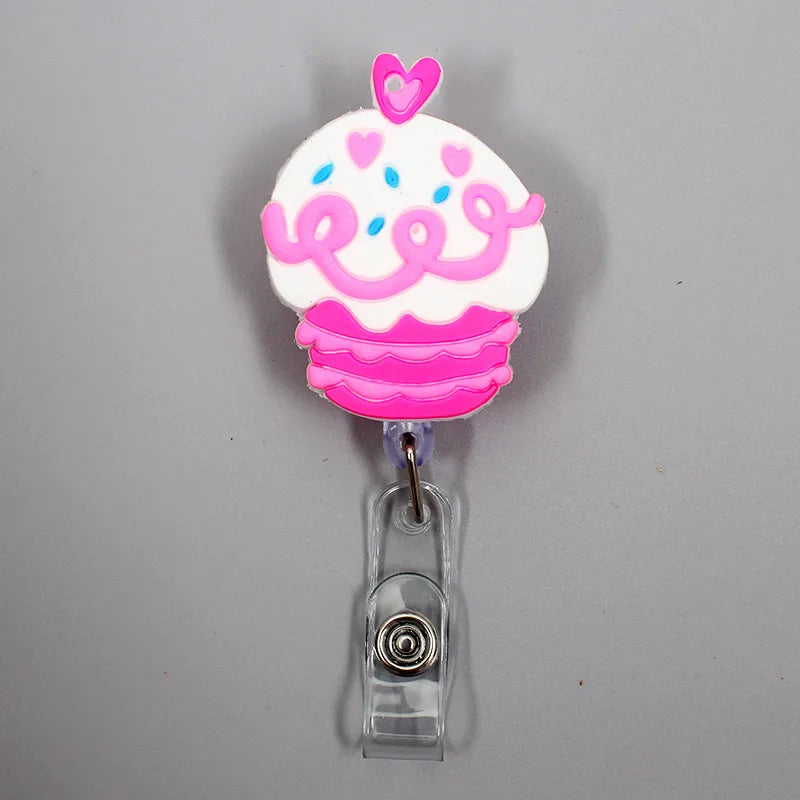 Add fun to your work or school day with this adorable 1PC Donuts & Cake Retractable Badge Reel. Perfect for kids, students, or nurses, it features a durable ABS reel, silica gel clip, and a 60cm retractable length. A cute, practical way to carry your ID or name tag with style!