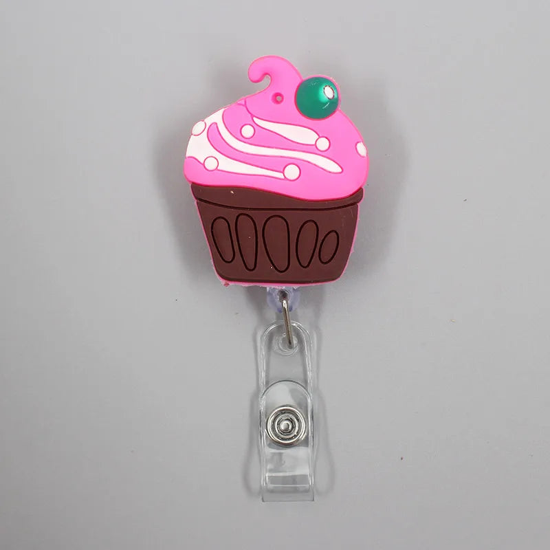 Add fun to your work or school day with this adorable 1PC Donuts & Cake Retractable Badge Reel. Perfect for kids, students, or nurses, it features a durable ABS reel, silica gel clip, and a 60cm retractable length. A cute, practical way to carry your ID or name tag with style!