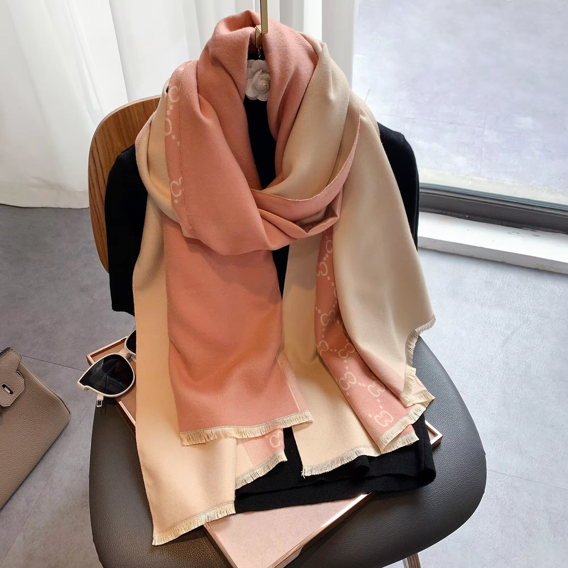 Stay warm and stylish this winter with our Luxury Women's Scarf. Made from soft, cashmere-feel fabric, this double-sided scarf offers both comfort and elegance. Perfect for layering, it’s a must-have accessory for cold weather, adding warmth and luxury to your winter wardrobe.