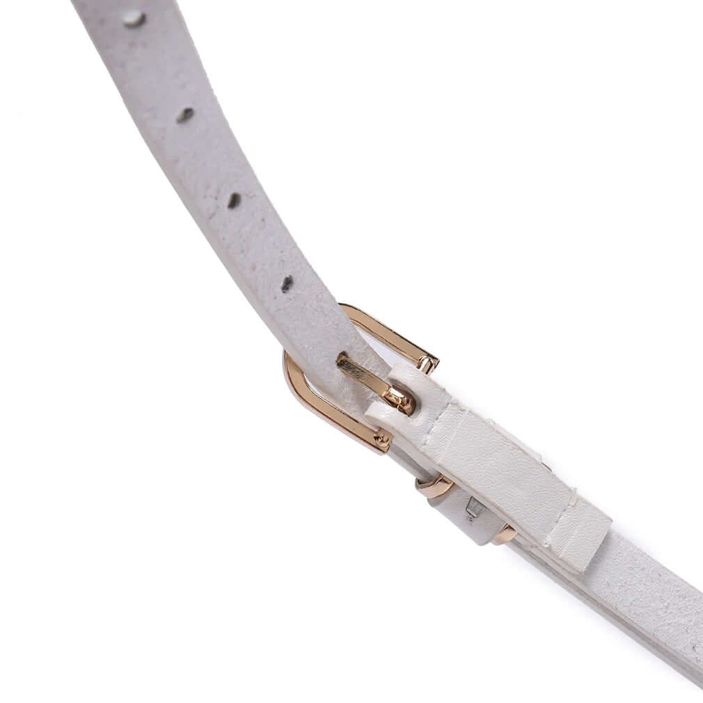 Elevate your outfits with the Beltox Women's Skinny Leather Belt, a versatile waist or hips ornament. Available in multiple colors with a chic gold alloy buckle, this belt complements dresses, jeans, slacks, and jackets. Designed for sizes 24-48 inches, it offers a perfect fit for both regular and plus sizes. Fast Amazon fulfillment and easy returns ensure a hassle-free shopping experience. Add a stylish touch to your wardrobe with this essential accessory!