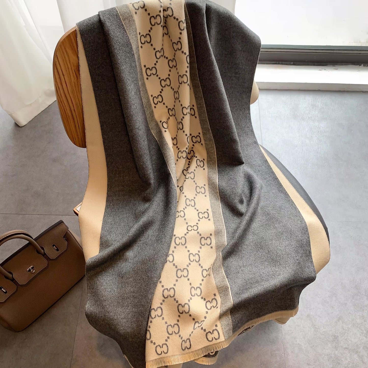 Stay warm and stylish this winter with our Luxury Women's Scarf. Made from soft, cashmere-feel fabric, this double-sided scarf offers both comfort and elegance. Perfect for layering, it’s a must-have accessory for cold weather, adding warmth and luxury to your winter wardrobe.